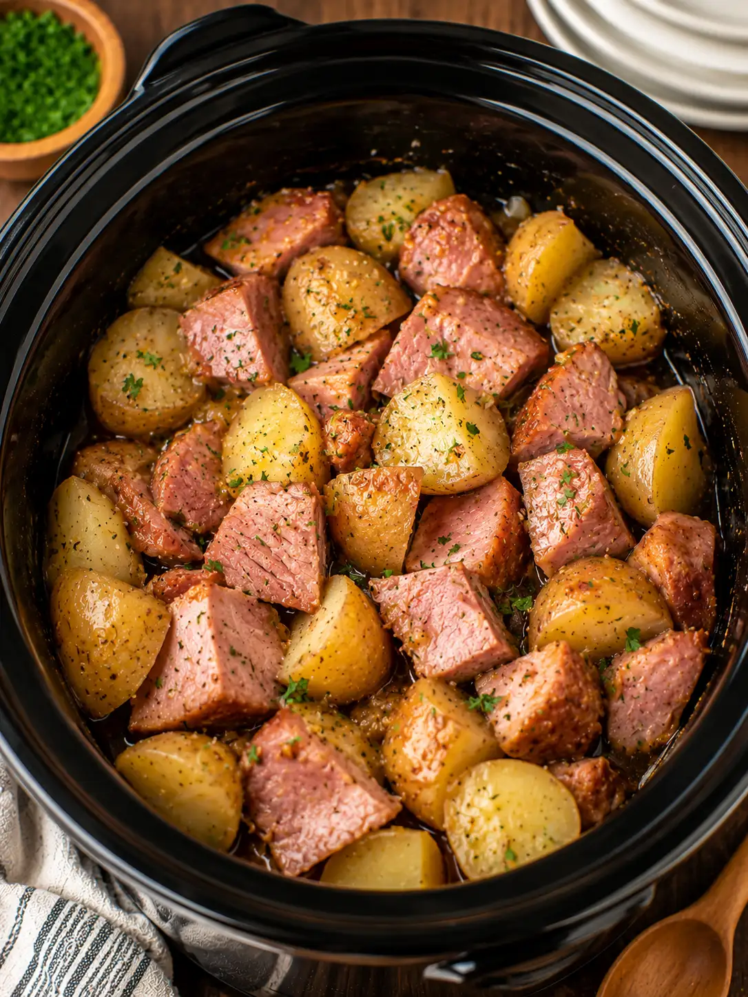 Slow cooker ham and potatoes in a creamy cheese sauce