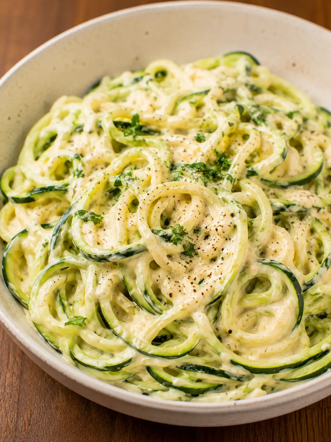 Zucchini noodles in a creamy parmesan alfredo sauce